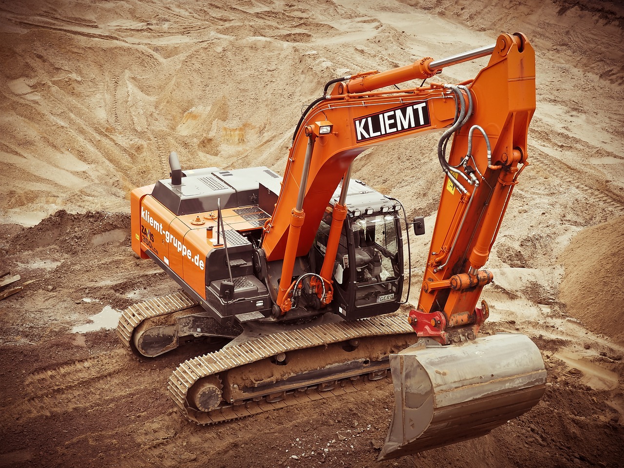 excavator digging a hole for commercial pool